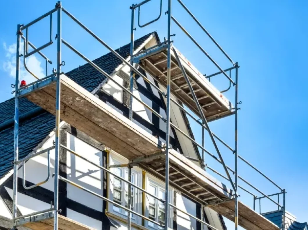 Scaffolding in front of exterior of hotel undergoing renovations.jpg